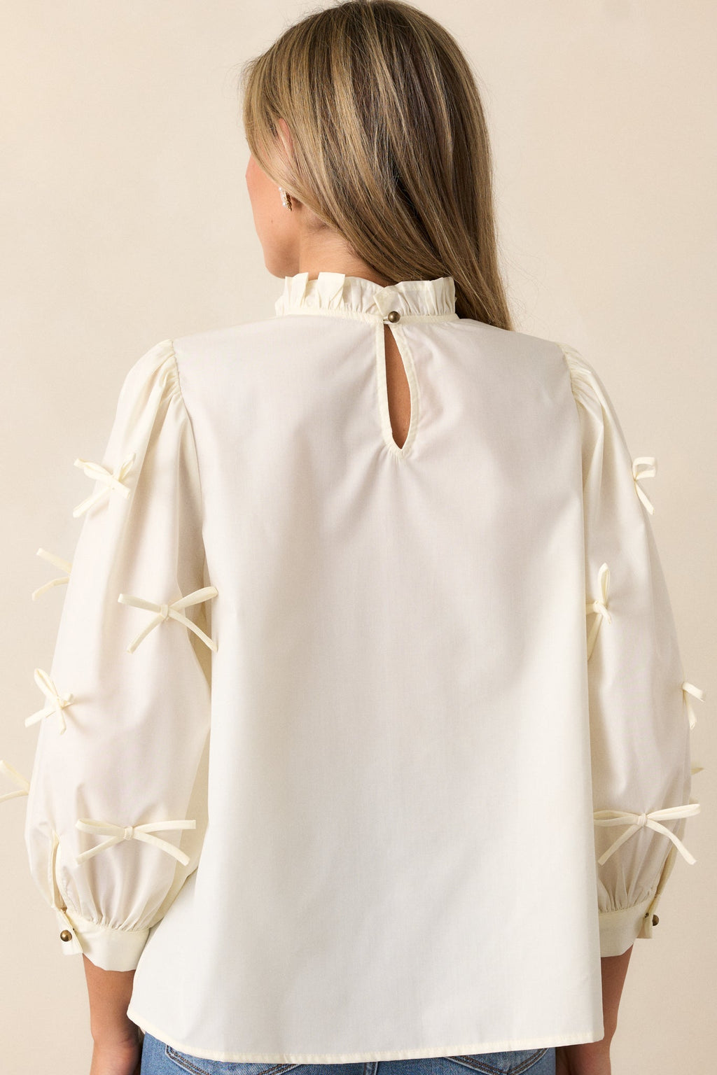 Drifting Currents Ivory Bow Blouse