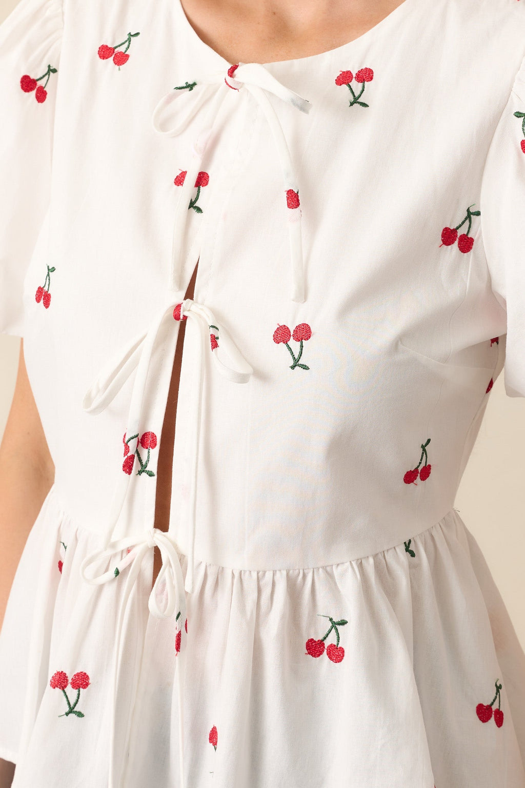 Pucker Up White Cotton Cherry Embroidered Peplum Top