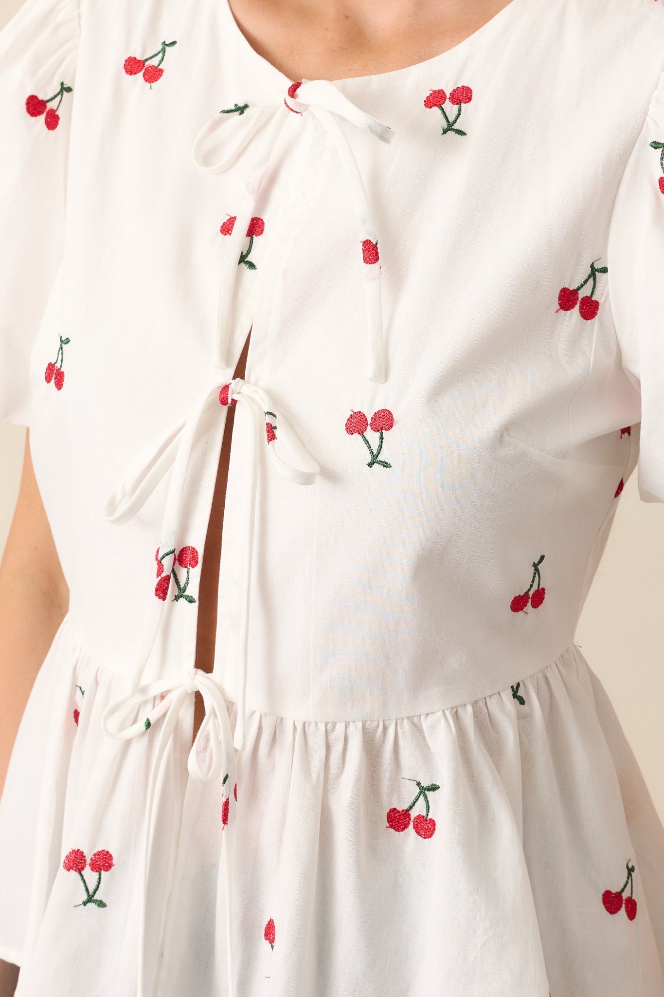 Pucker Up White Cotton Cherry Embroidered Peplum Top